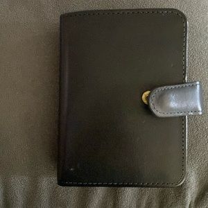 Never used. Coach men’s wallet